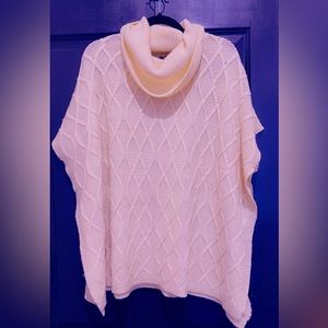 Beautiful sweater poncho by Poof!